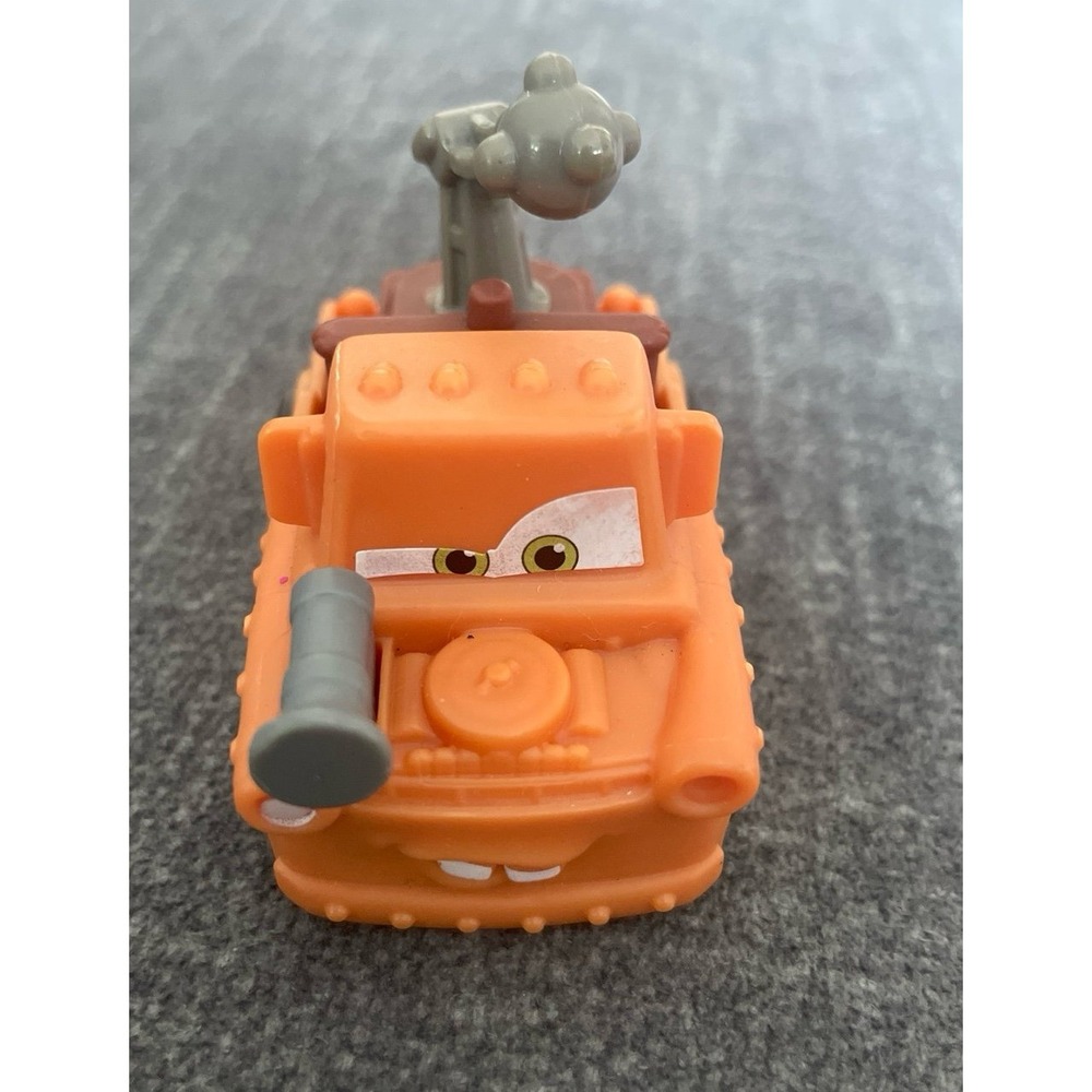 Mater from the Disney Pixar movie Cars. This toy was a part of a McDonald's Happ
